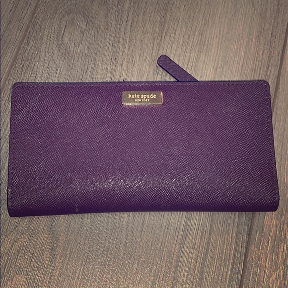 kate spade Handbags - Kate Spade slim envelope wallet, dark purple